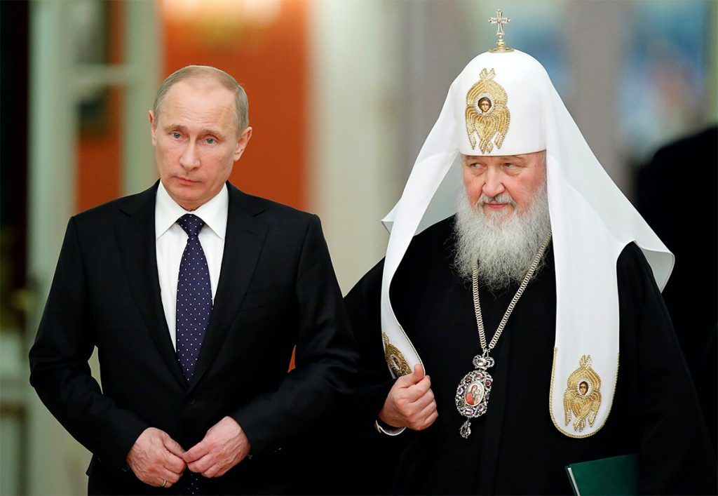 Vladímir Putin junto al Patriarca de Moscú.