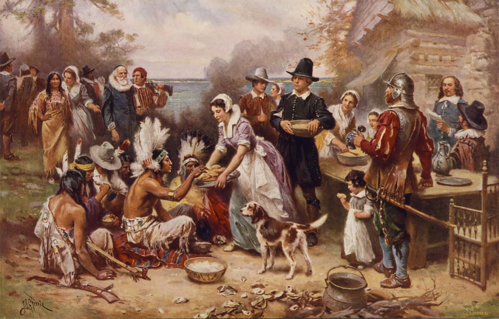 Los peregrinos puritanos en su primer día de acción de gracias en Norteamérica.
