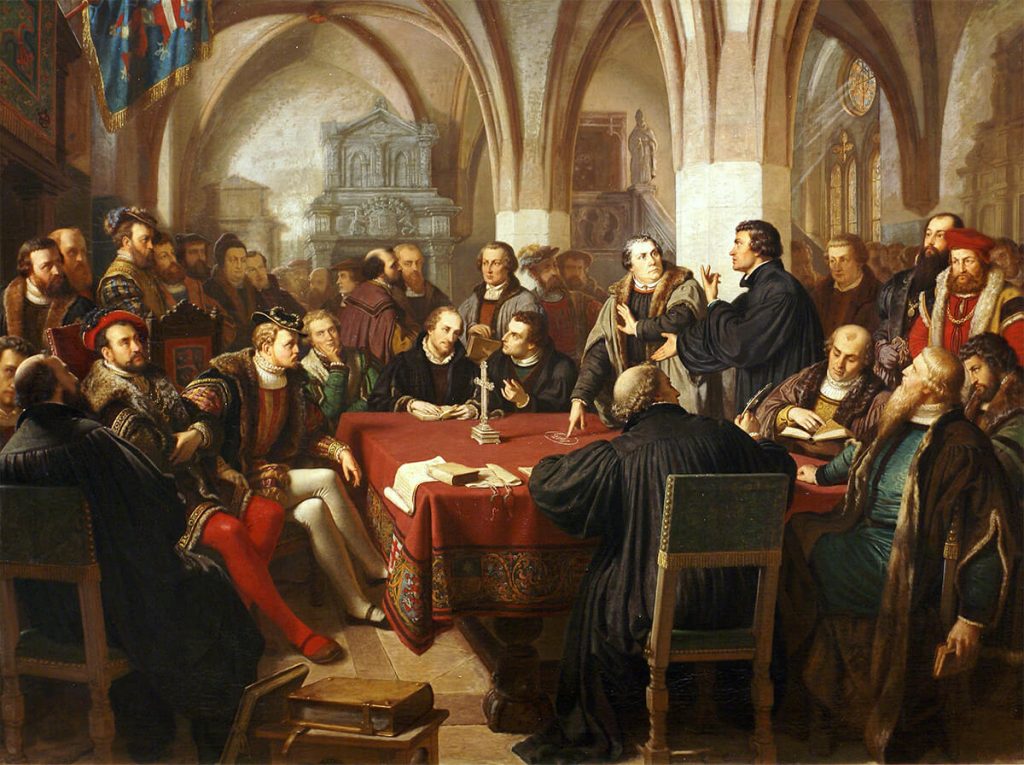 Pintura que representa la reunión entre Lutero y Zwinglio.