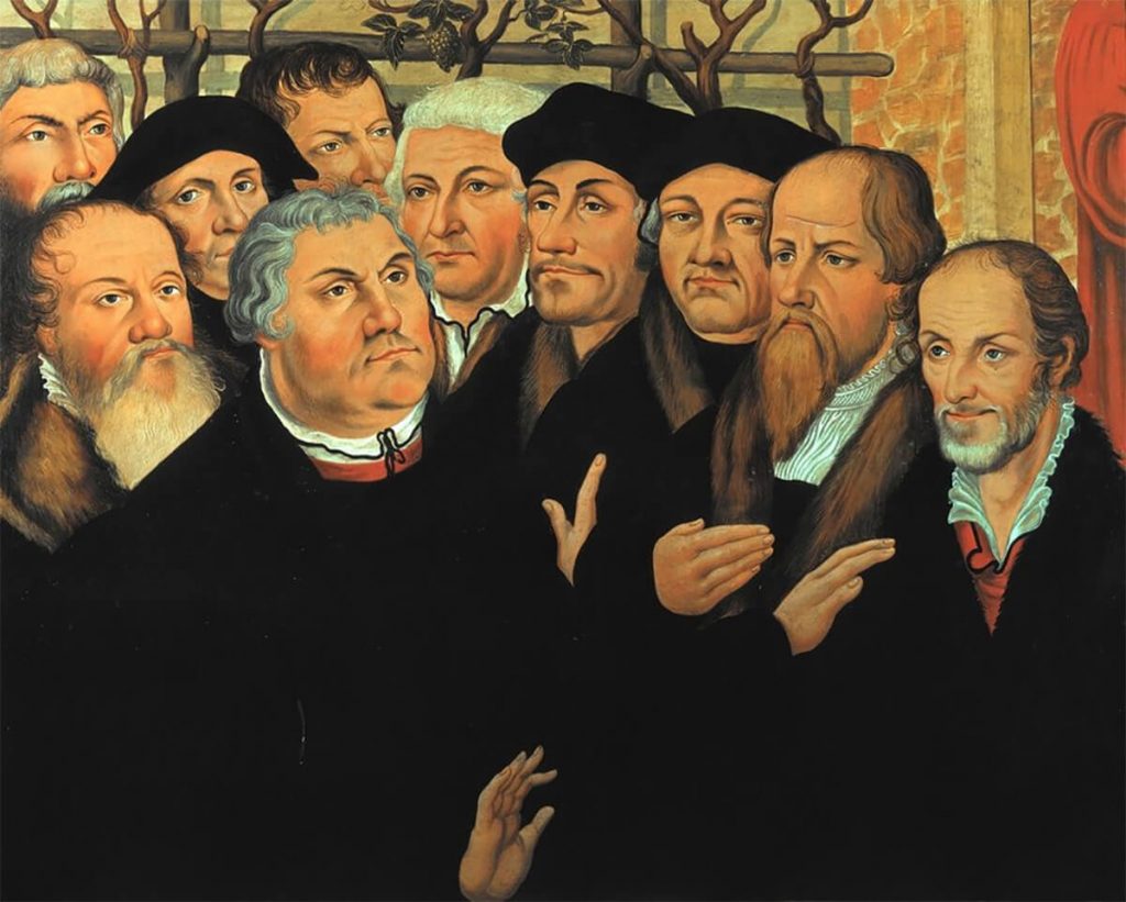 Grupo de reformadores, de izquierda a derecha: Johann Forster, George Spalatin, Martín Lutero, Johannes Bugenhagen, Erasmo de Rotterdam, Justus Jonas, Caspar Cruciger y Philipp Melanchthon.