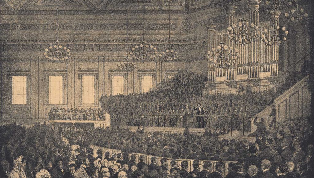 Charles Spurgeon predicando a una multitud.
